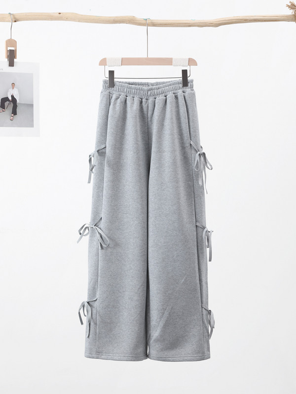 Bow Bikses Sieviešu gadījuma mežģīņu Elastīgs viduklis Modes Bikses Sieviešu 2024 Pavasara Cieta Mīksta Brīvas Platas Kājas Sporta bikses Dāmu