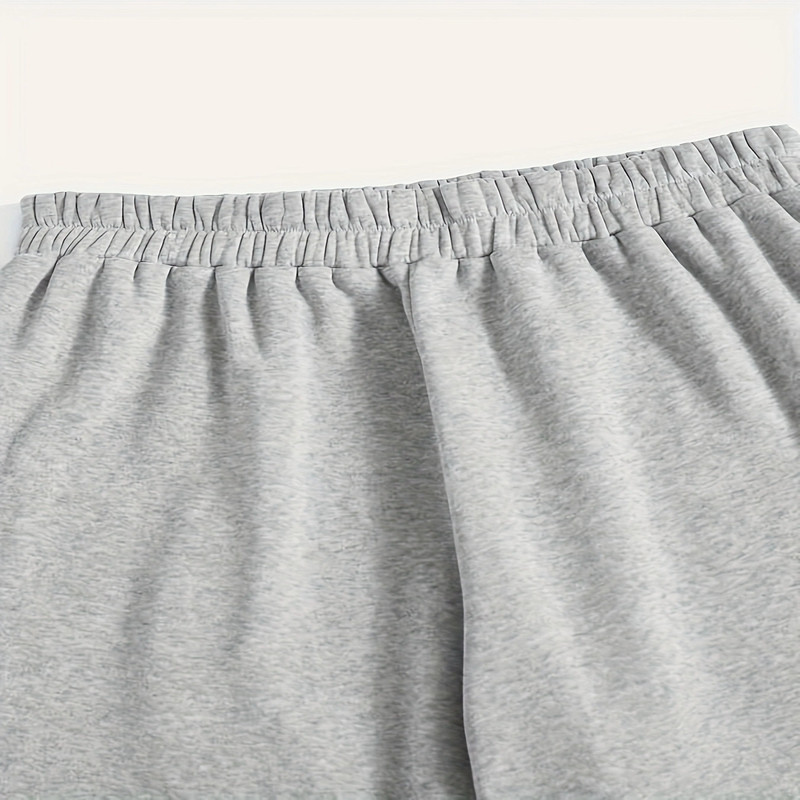 Sieviešu liela izmēra modes ikdienas brīvas elastīgas skriešanas bikses vienkrāsainas ikdienas ērtas sporta bikses