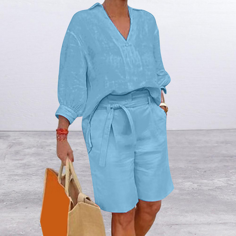 Vasaras brīvs divdaļīgs komplekts sievietēm Modes krekls ar puspiedurknēm V veida kakla izgriezumu, taisns kabatas jostas bikses Kokvilnas lina tērps