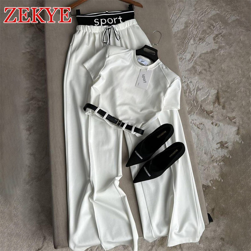 Zekye Ležerni bijeli široki komplet hlača širokih nogavica Ženska odjeća Korejski patchwork ulični stil Majice kratkih rukava 2 komada.