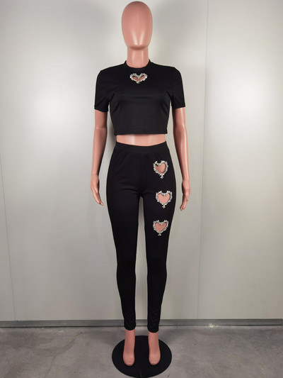 Kricesseen ženske komplet trenirki s kristalnim srcem i detaljima od 2 komada Glam šljokice Majica i komplet hlača Seksi klupska odjeća