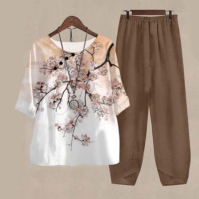 Novi ljetni dvodijelni kompleti Ženska odjeća s bijelim cvjetnim uzorkom Elegantna ženska O izrezom Široka košulja kratkih rukava Odijelo s hlačama visokog struka