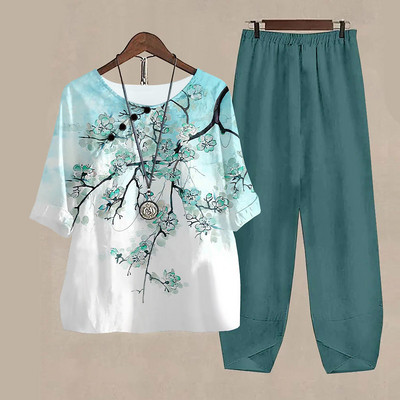 Novi ljetni dvodijelni kompleti Ženska odjeća s bijelim cvjetnim uzorkom Elegantna ženska O izrezom Široka košulja kratkih rukava Odijelo s hlačama visokog struka