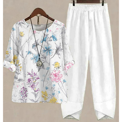 Novi ljetni dvodijelni kompleti Ženska odjeća s bijelim cvjetnim uzorkom Elegantna ženska O izrezom Široka košulja kratkih rukava Odijelo s hlačama visokog struka