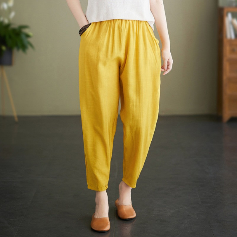 2023. aasta suvi Naisteriided Uued populaarsed Imitatsioon Ice Silk Puuvill Kanep vabaaja mood lai jalg 9/4 suured lahtised Harlani püksid