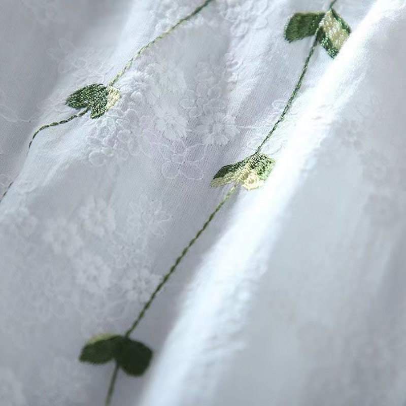 Värske pitstikandid ees lühike taga pikk V-kaelusega puhtast puuvillast pluus naiste top 2023 kevad ja suvi uus stiil