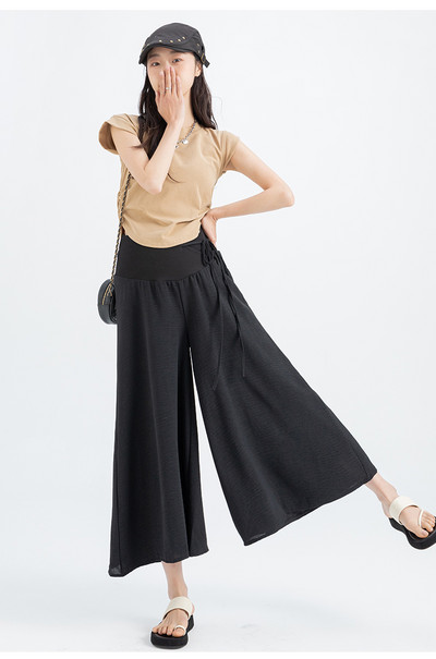 Japāņu stila lielizmēra grūtnieču bikses vasaras krustojumam ar zemu vidukli, aukliņu jostasvietā grūtniecēm, platas bikses brīvas