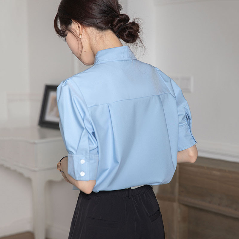 Ženska bijela košulja kratkih rukava u ljetnom korejskom stilu 2024., modne jednobojne široke uredske majice