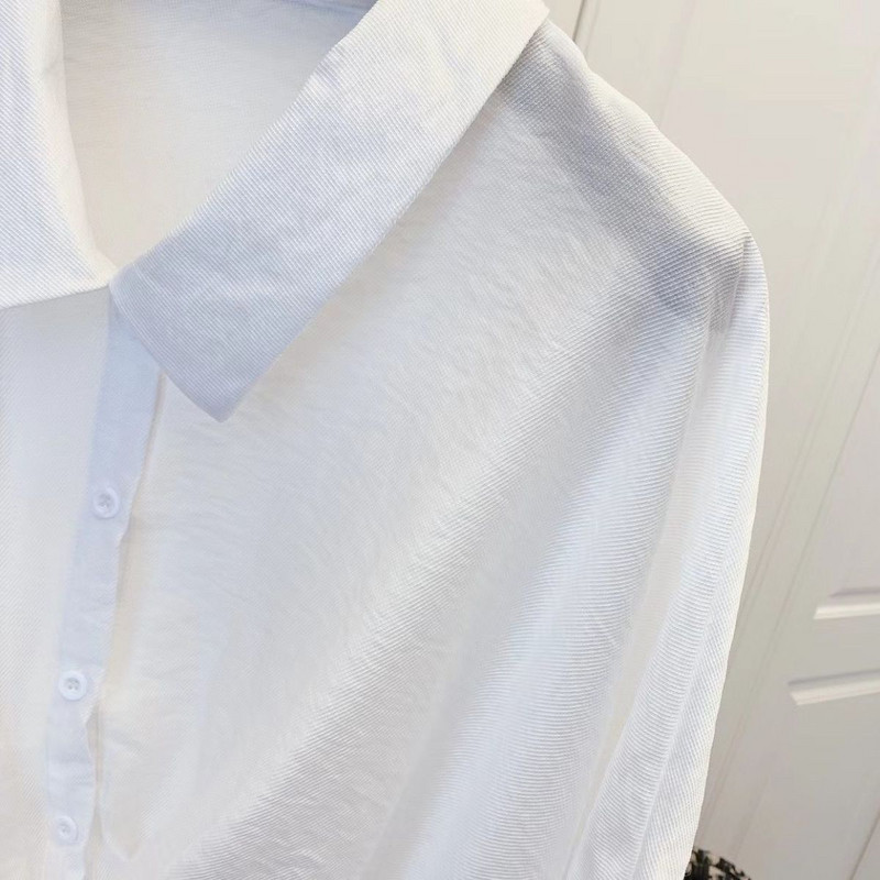 Elegantna nepravilna košulja za žensku ljetnu odjeću 2024. Novo korejsko izdanje Opuštena i mršava Svestrana temperamentna majica velikih veličina