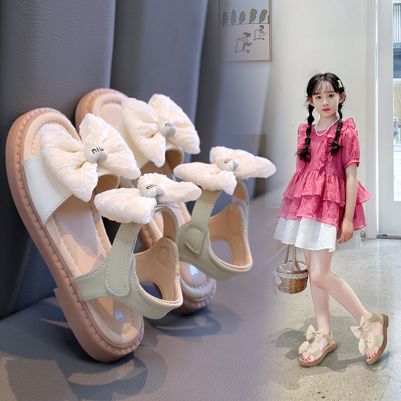Tüdrukute printsessisandaalid 2024 Korea versioon Uus Bow Moodsad lastesandaalid Pehmed tallad libisemiskindlad