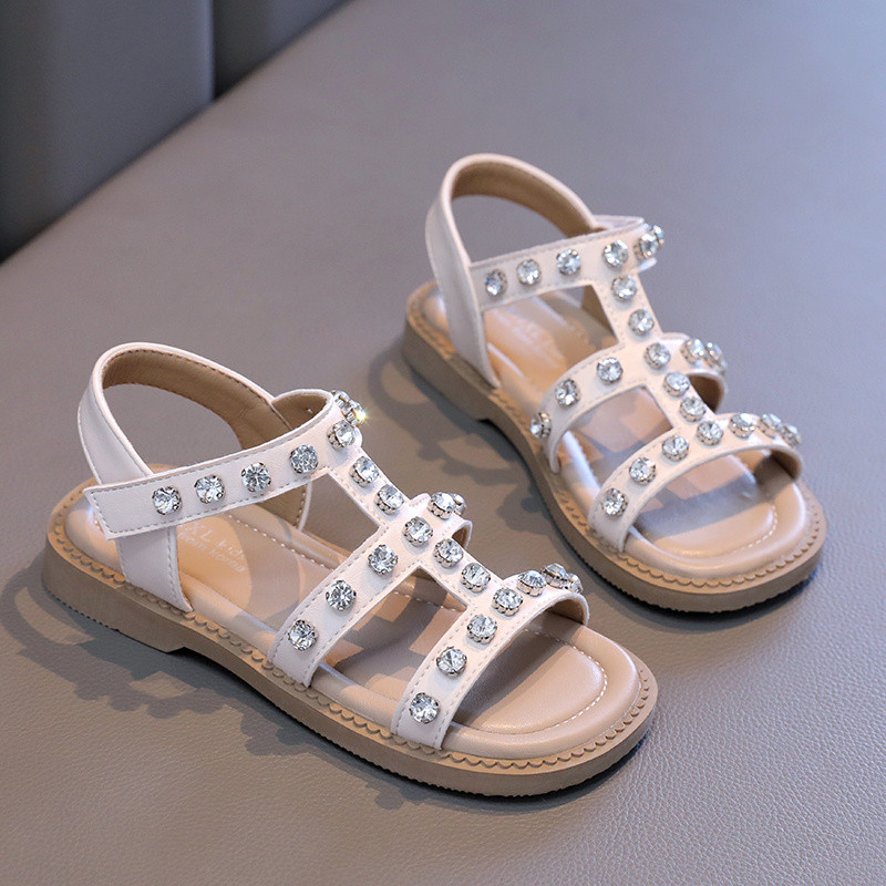2024. aasta suvi uues stiilis moodsad mugavad ja vabaaja keskmised ja suured lamedad kivist kivist avatud varbaga sandaalid tüdrukutele