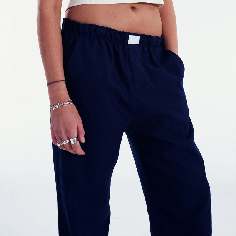 Naiste vabaaja aluspüksid lahtised vertikaalsed triibulised prindiga elastsed taskutega salongipüksid Kodus kannab magamisriideid