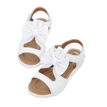 Детски обувки 2023 Летни кухи плоски сандали Сладък лък Твърди обувки за момичета Бебешки римски сандали Ежедневни плажни обувки с мека подметка Сандалии
