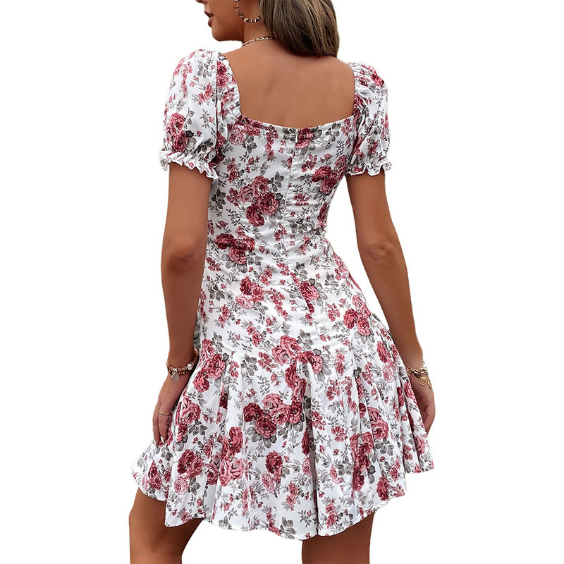 Vasaras jauna brīvdienu kleita ar pufām piedurknēm sievietēm ar ziedu apdruku kaklasaites priekšpuse kleita ar slīpu kakla izgriezumu ar īsām piedurknēm līdz ceļgaliem brīvdienu pludmales kleita