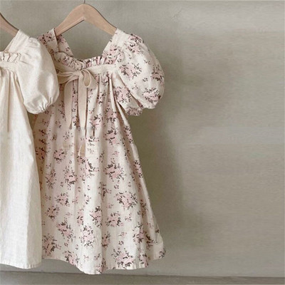 Kleitas korejiešu versija jaunai meiteņu vasaras kleitai ar bantīti ar burbuļpiedurknēm salda ziedu kvadrātveida kakla kleita