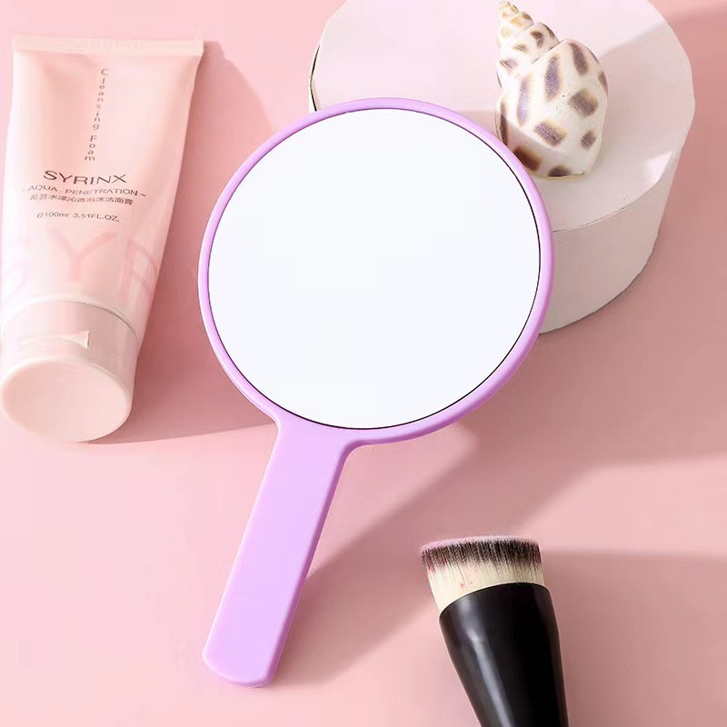 Jauki krēmkrāsas apaļš kosmētikas spogulis meitenei dāvanu rokai Mini salokāms pārnēsājams tualetes spogulis kabatas divpusējs aplauzums kompakts spogulis