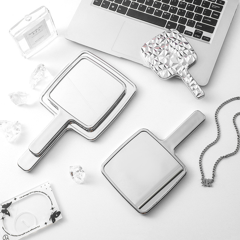 Pārnēsājams Mini Ins šķidras formas rokas spogulis kvadrātveida kosmētikas kosmētiskais spogulis ar rokturi, skaistumkopšanas spoguļi skropstu pieaudzēšanai