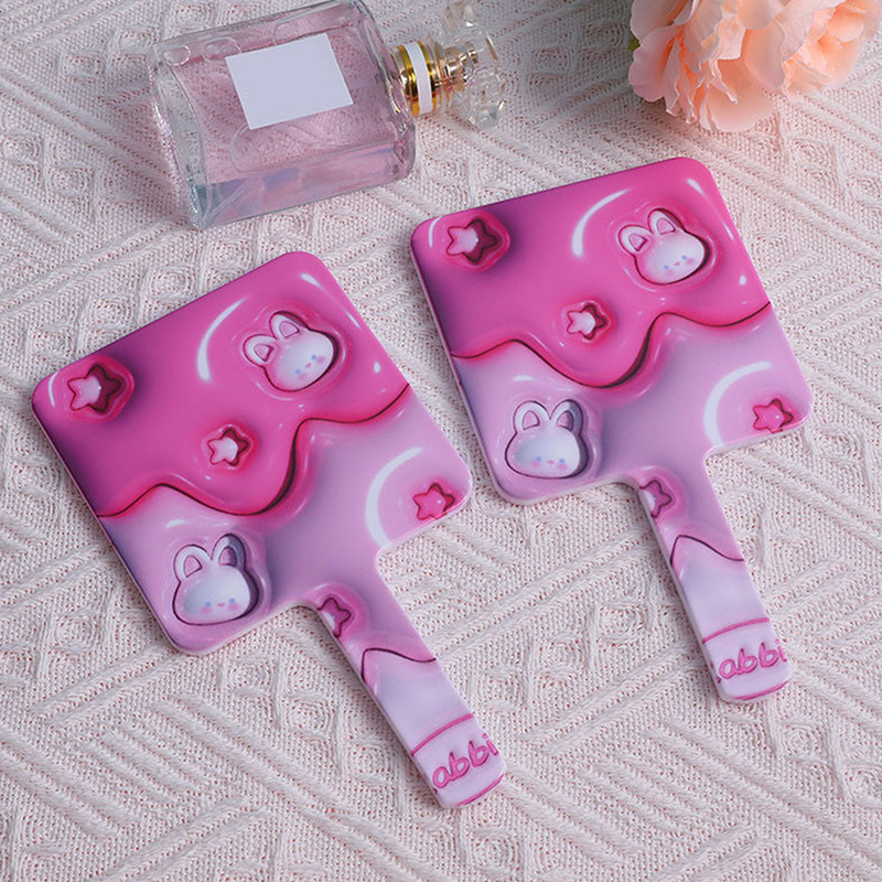 Rokas grima spogulis jauks multfilmas trusis kvadrātveida grima spogulis ar roktura spoguli Spa salona kompaktie spoguļi kosmētikas spogulis