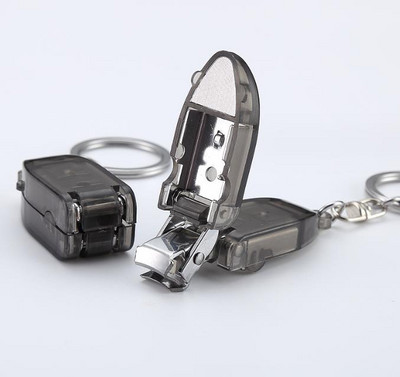 2023 legmenőbb új eladó Mini hordozható körömvágó műanyag fogantyús forgó körömvágó kulcstartóval a kínai gyárból