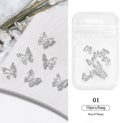 10gab/maisiņš Spīdīgs sakausējums Butterfly Nagu piekariņi Metāla Butterfly Star Nagu Dārgakmeņi 3D Rhinestones Manikīrs Rotaslietas DIY Nagu aksesuāri