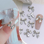 10 komada 3D srebrni zlatni leptir nakit Nail Art nitne Modni ženski privjesci za nokte Bowknot Srce Nokti Rhinestones Dekoracija za manikuru