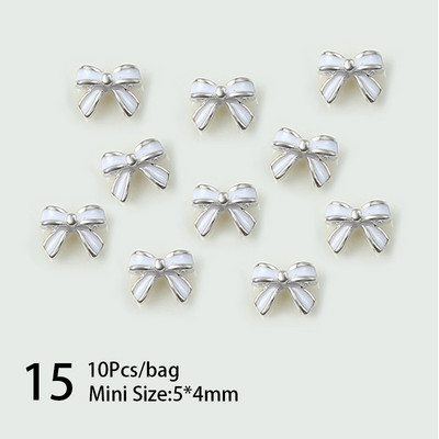 10 komada 3D srebrni zlatni leptir nakit Nail Art nitne Modni ženski privjesci za nokte Bowknot Srce Nokti Rhinestones Dekoracija za manikuru