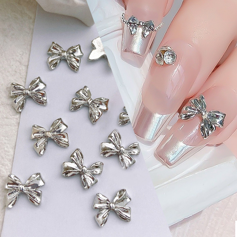 10 komada 3D srebrni zlatni leptir nakit Nail Art nitne Modni ženski privjesci za nokte Bowknot Srce Nokti Rhinestones Dekoracija za manikuru