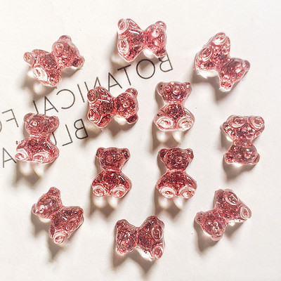 10 gab. Pink Bear nagu mākslas piekariņi 3D jauka multfilma 9 krāsu sveķu lācis nagu rotaslietas rotājumi DIY Kawaii manikīra nagu aksesuāri