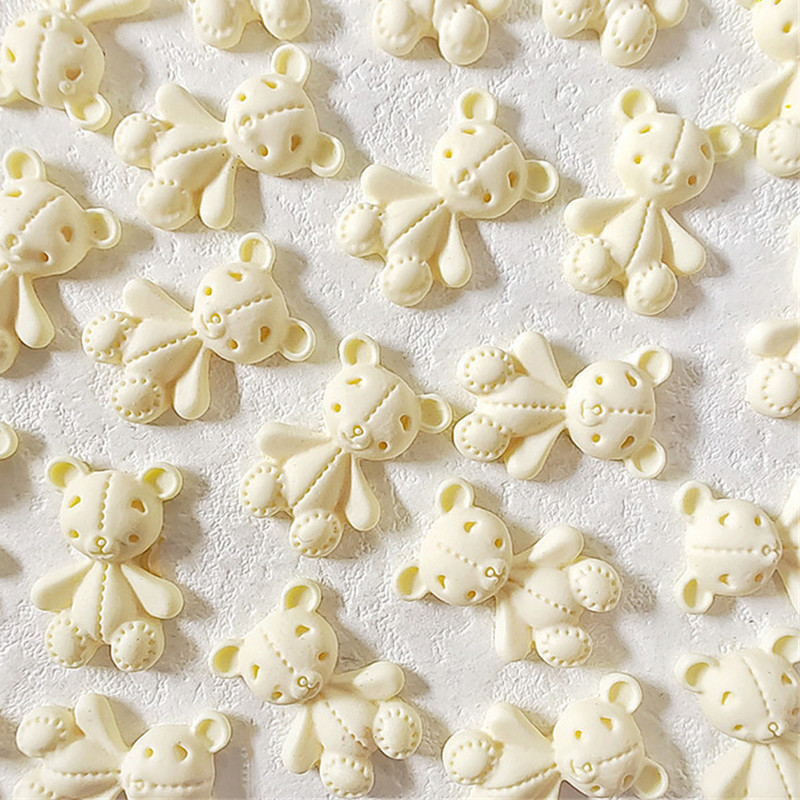 10 gab. Pink Bear nagu mākslas piekariņi 3D jauka multfilma 9 krāsu sveķu lācis nagu rotaslietas rotājumi DIY Kawaii manikīra nagu aksesuāri