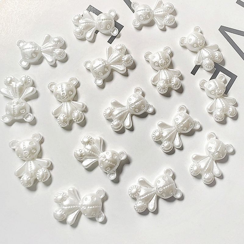 10 gab. Pink Bear nagu mākslas piekariņi 3D jauka multfilma 9 krāsu sveķu lācis nagu rotaslietas rotājumi DIY Kawaii manikīra nagu aksesuāri