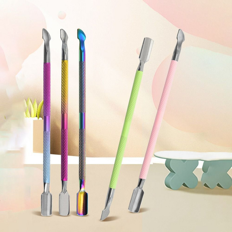 Tērauda dubultspiešanas karotes stūmējs griezuma noņemšanas līdzeklis kutikulas trimmeris manikīra pedikīra kopšanai nagu mākslas rīks