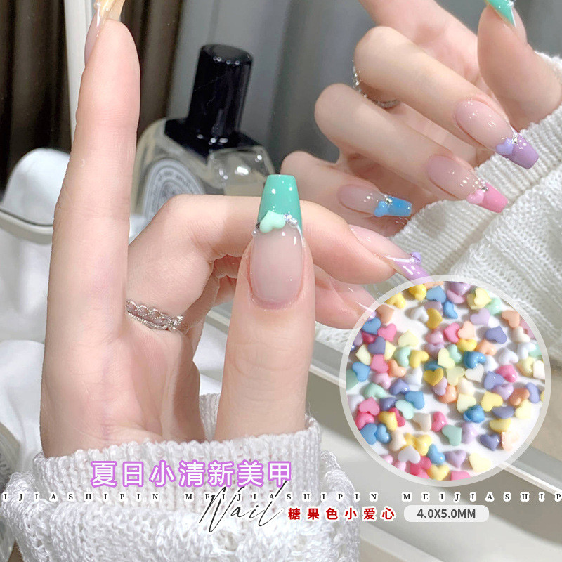 100 gab. Nail Art Mini Sirds piekariņi, 4 x 5 mm maisījums/balti sveķi, jauki Rhinestones, sirds formas nagu 3D uzlīmes manikīra nagu piegādei