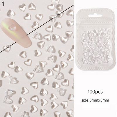 100 gab. 3D caurspīdīgs kalnu kristāls mīlestības sirds piekariņi nagu mākslas dekorēšanai, dzidru sveķu nagu piekariņi Juvelierizstrādājumu manikīra aksesuāri