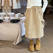 2024 Spring Girls vienkrāsaini vidēja garuma svārki zīdaiņu bērnu ventilācijas kabatas svārki