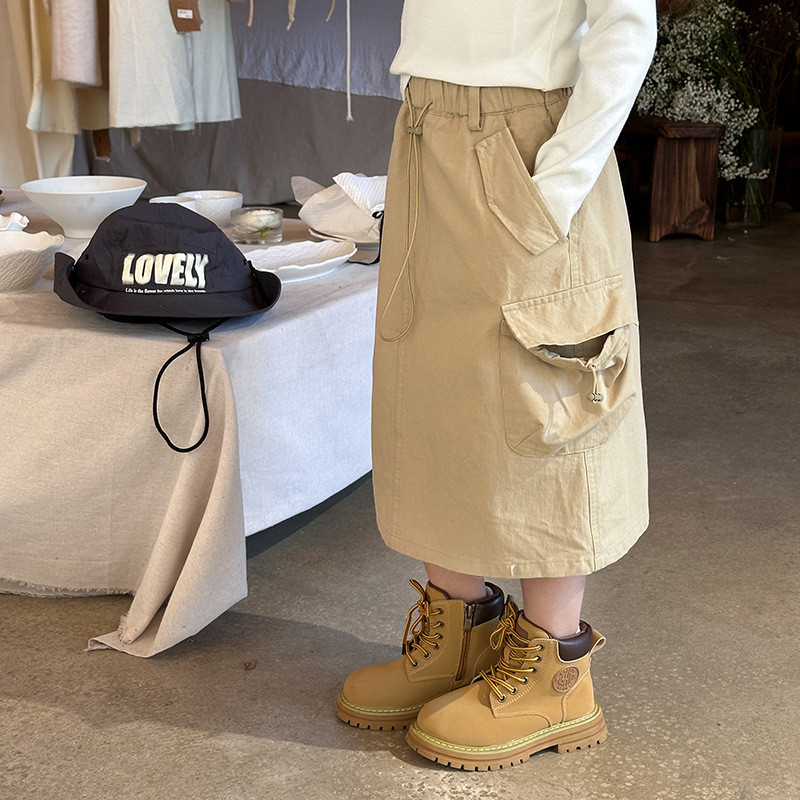 2024 Spring Girls vienkrāsaini vidēja garuma svārki zīdaiņu bērnu ventilācijas kabatas svārki