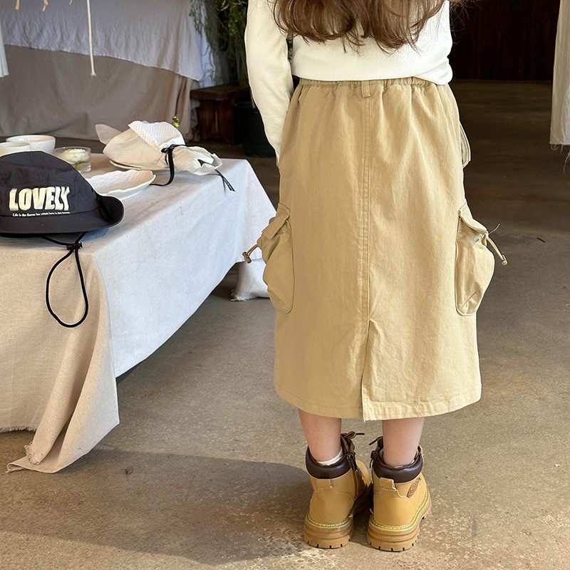 2024 Spring Girls vienkrāsaini vidēja garuma svārki zīdaiņu bērnu ventilācijas kabatas svārki