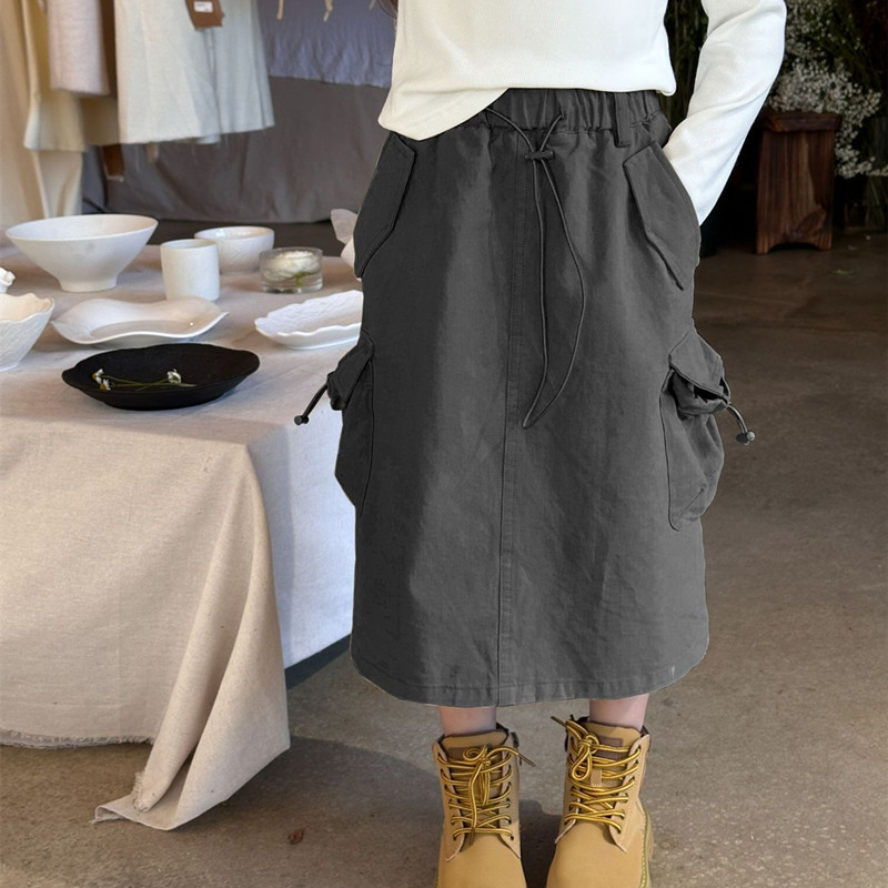 2024 Spring Girls vienkrāsaini vidēja garuma svārki zīdaiņu bērnu ventilācijas kabatas svārki