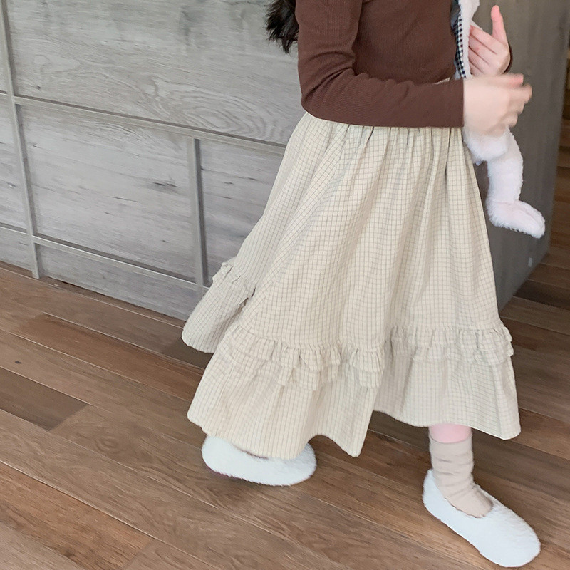 Bērnu apģērbi meiteņu svārki korejiešu stilā, 2023. gada jauni, moderni rudens vidēja garuma rūtaini vienkrāsaini mežģīnes ikdienas vienkārši svārki