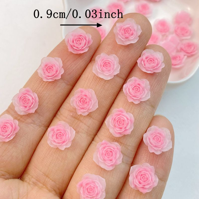 50 gab. Jaukti nagu mākslas sveķi multfilmas rozā ziedu sērija piekariņi Rhinestones DIY amatniecība nagu 3D rotājumi rotaslietas