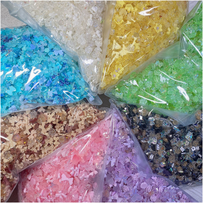 50 komada mješovitih dizajna privjesaka za nokte Sjajne Aurora mašne u obliku cvjetnih kamenčića za nokte 3D smolasti cvijet Nail Art Decorations Dijelovi