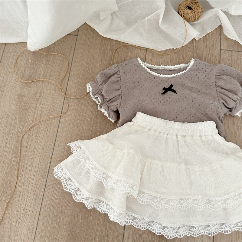 22204 Odjeća za bebe Novo ljeto 2024 Jednobojna dječja suknja od čipke Spajanje slatke suknje za djevojčice od 1 do 7 godina