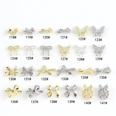 10 τμχ/παρτίδα Alloy Butterfly Nail Charms 3D Bow Nail Art Μανικιούρ Κοσμήματα Κοίλο χρυσό/ασημί παπιγιόν Ανταλλακτικά νυχιών Μαζικές προμήθειες