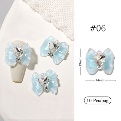 10 gab. Lentes Sveķu Bowknot Spīdīgas Nagu daļas Sakausējums Sirds Rhinestone Butterfly Nagu piekariņi nagu dekorēšanai Piederumi Izejmateriāli