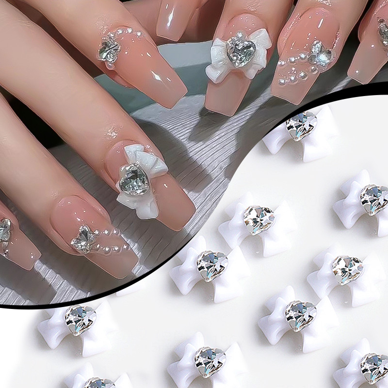 10 gab. Lentes Sveķu Bowknot Spīdīgas Nagu daļas Sakausējums Sirds Rhinestone Butterfly Nagu piekariņi nagu dekorēšanai Piederumi Izejmateriāli