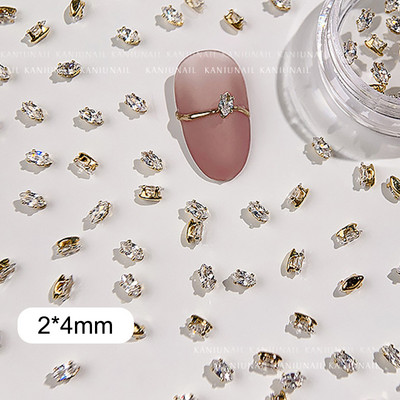 40 gab. Spīdīga kristāla 3D nagu mākslas kalnu strēles rotājumi forma plakana stikla dimanta rotaslietas dizaina manikīra aksesuāri