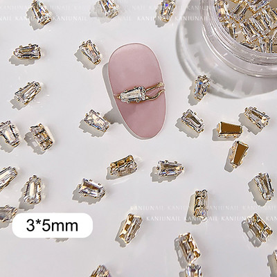 40 gab. Spīdīga kristāla 3D nagu mākslas kalnu strēles rotājumi forma plakana stikla dimanta rotaslietas dizaina manikīra aksesuāri