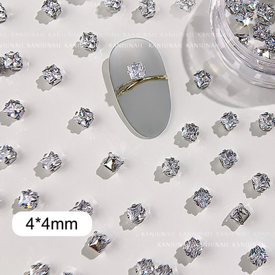 40 gab. Spīdīga kristāla 3D nagu mākslas kalnu strēles rotājumi forma plakana stikla dimanta rotaslietas dizaina manikīra aksesuāri