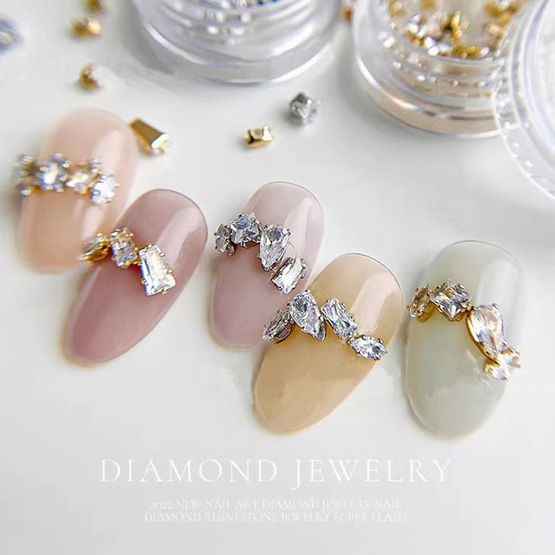 40 gab. Spīdīga kristāla 3D nagu mākslas kalnu strēles rotājumi forma plakana stikla dimanta rotaslietas dizaina manikīra aksesuāri