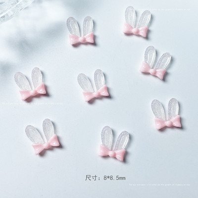 50 db Sötétben világító Kawaii Rabbit Ears Designs Köröm Gyanta Drágakövek Kövek Rózsaszín Aranyos Egyedi Design Bűbáj Ékszerek Körömhöz