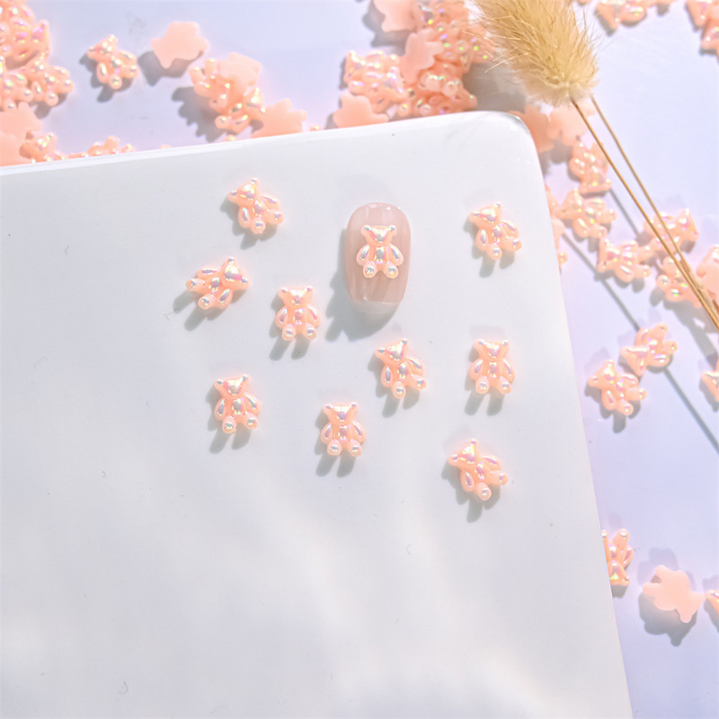 10 gab. Karikatūra Aurora Bear nagu piekariņi, 3D Kawaii Bear nagu mākslas dekori, DIY Aurora Resin Bear manikīra piederumi